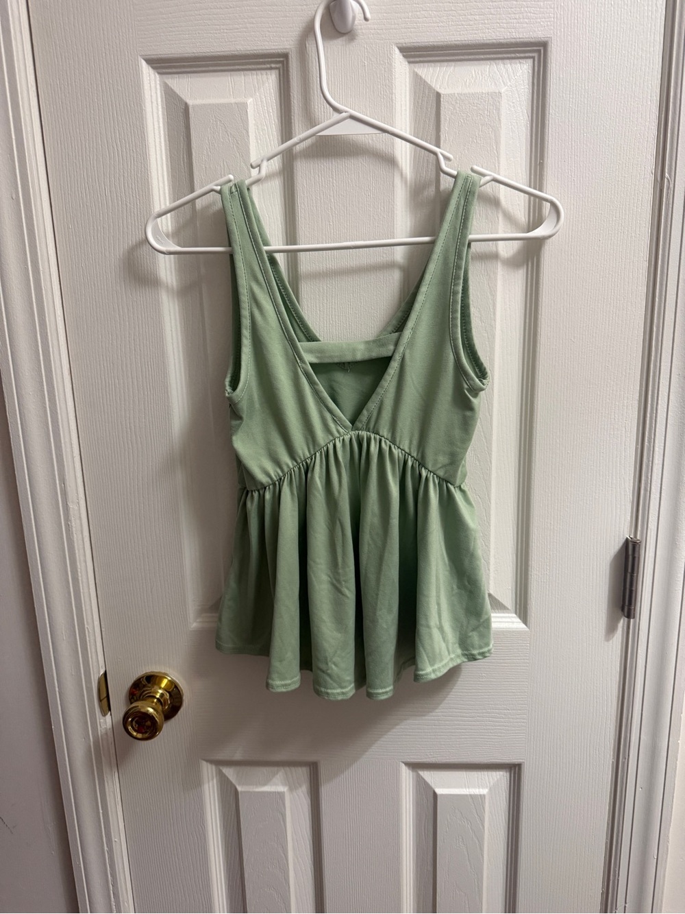 Sleeveless Light Green V-Neck Peplum Tank Top
